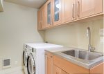 Laundry Room with Full size Washer and Dryer, Sink